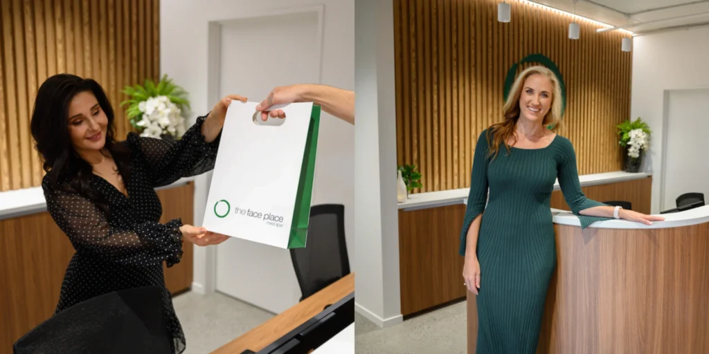 The Face Place NZ Banner Image The Face Place NZ Med Spa reception area with a client receiving a branded gift bag. A professional aesthetic injector stands at the reception desk, highlighting a welcoming environment for advanced skincare and cosmetic treatments in a modern clinic.